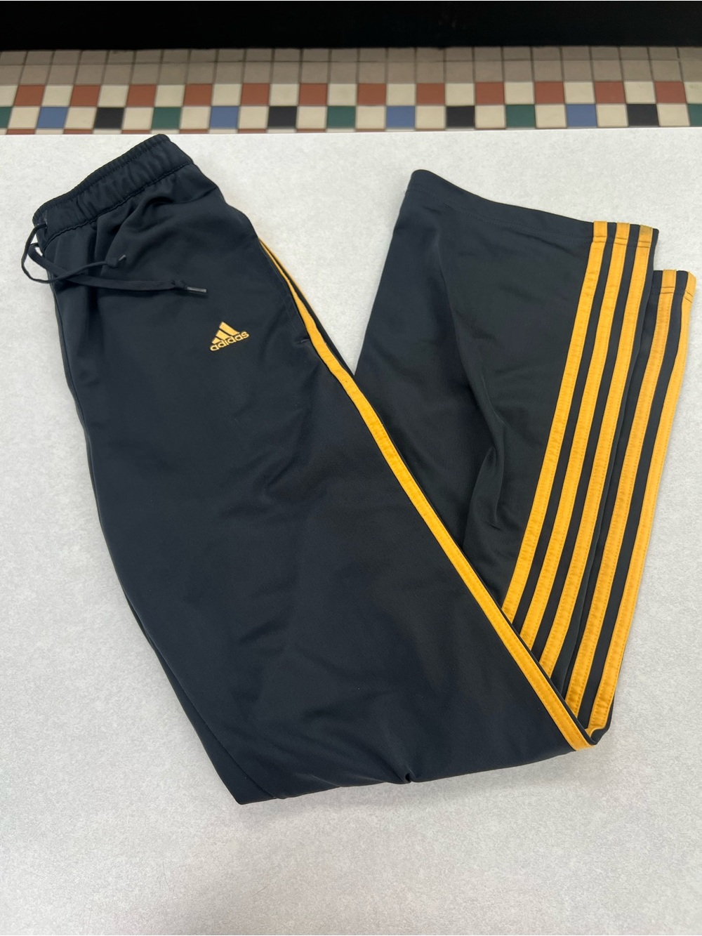 adidas Black Track Pants with orange Stripe Accents